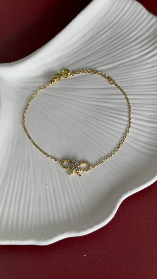 Golden Bow Charm Bracelet – Dainty Elegance