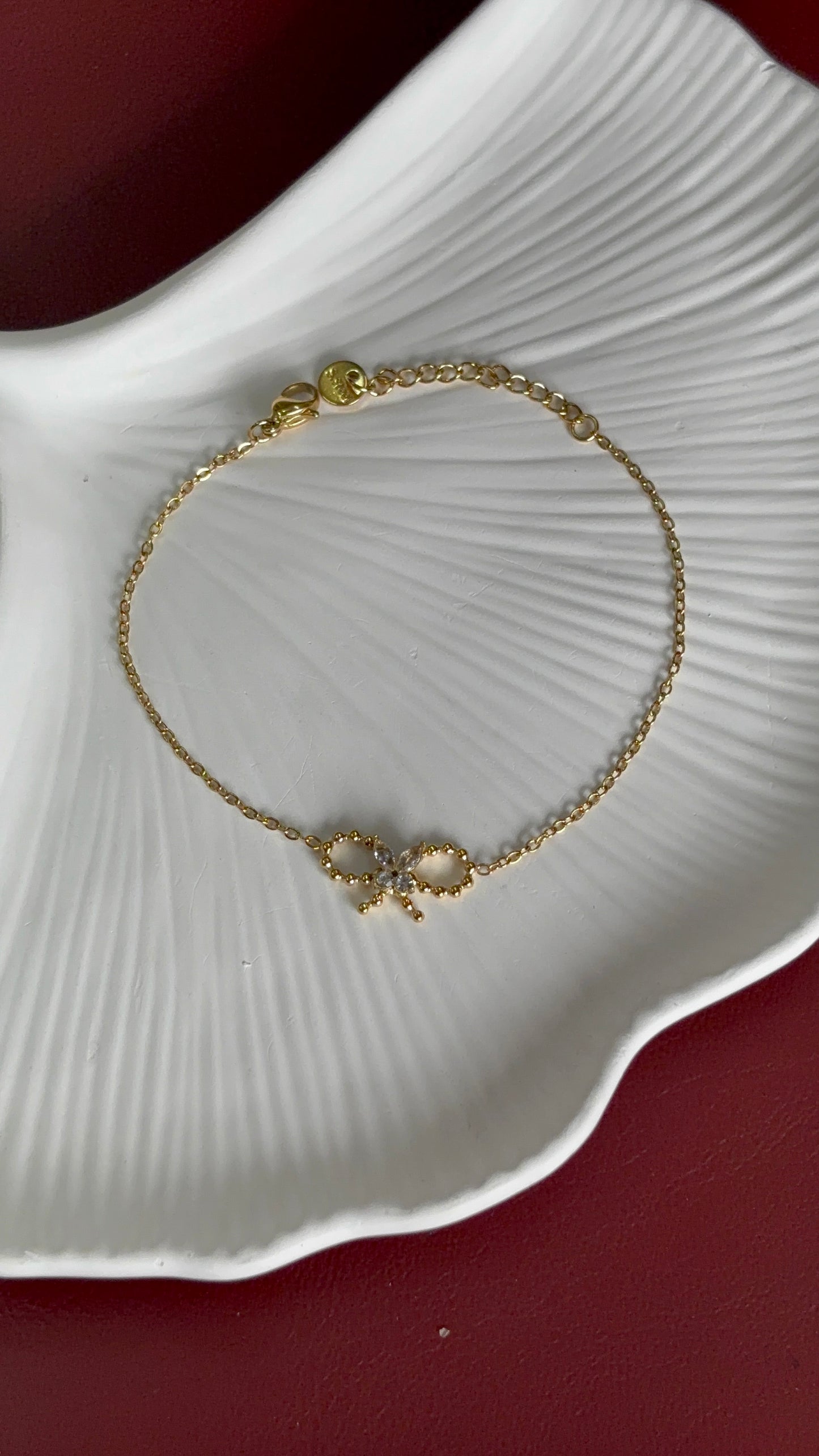 Golden Bow Charm Bracelet – Dainty Elegance
