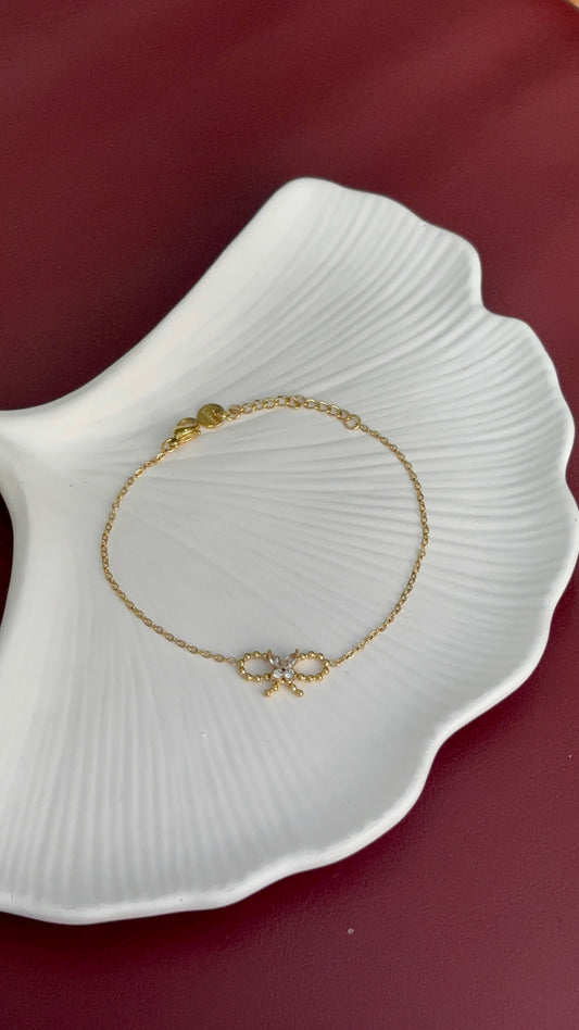 Golden Bow Charm Bracelet – Dainty Elegance